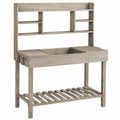 Gartenarbeitstisch 110 x 50 x 140 cm Holz grau mit Ablagen und Stauraum